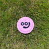 smooj frisbee on the grass